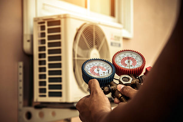 Professional Air Conditioning Service technician working in Rio Verde, AZ